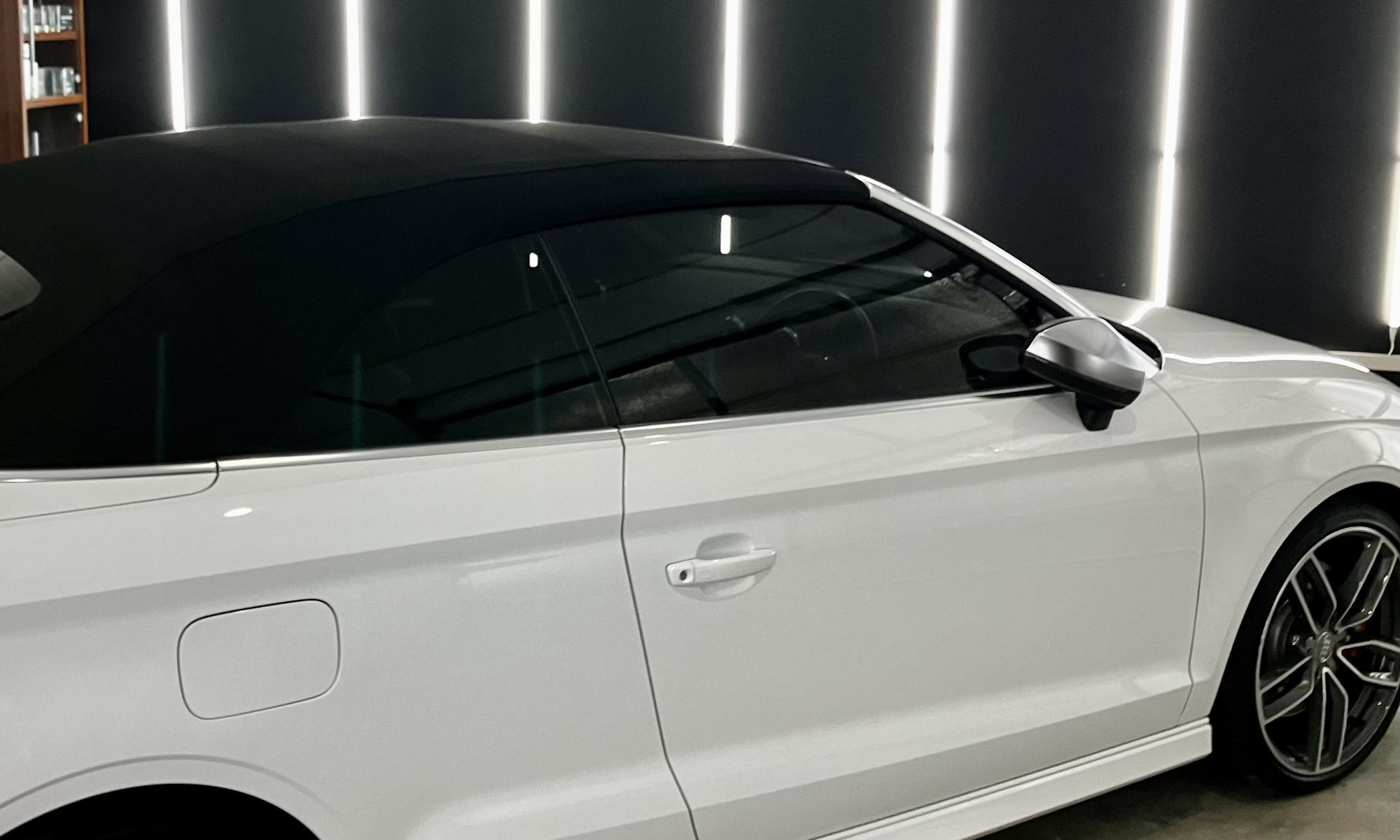 "Car detailing expert applying ceramic coating for a showroom finish in Gold Coast"