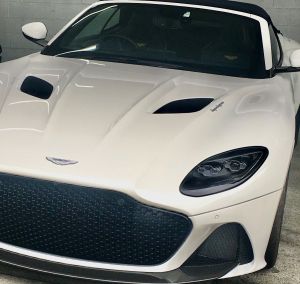 White Jaguar receiving professional cut and polish service on the Gold Coast — removing swirl marks and enhancing depth of shine